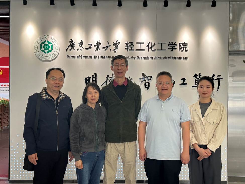 A group of people standing in front of a sign AI-generated content may be incorrect.